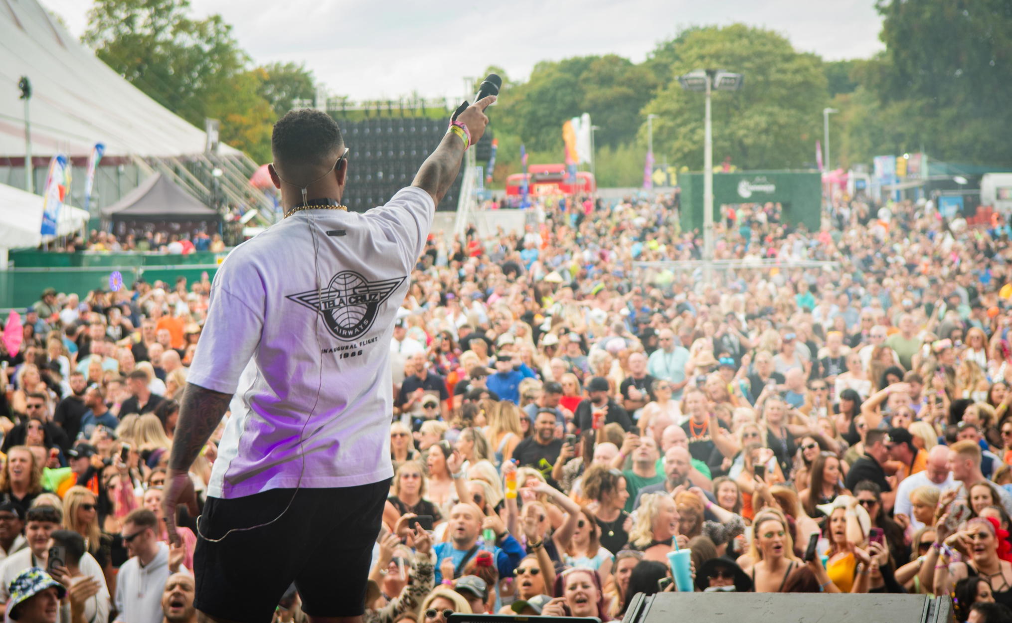 MC artist on stage with crowd